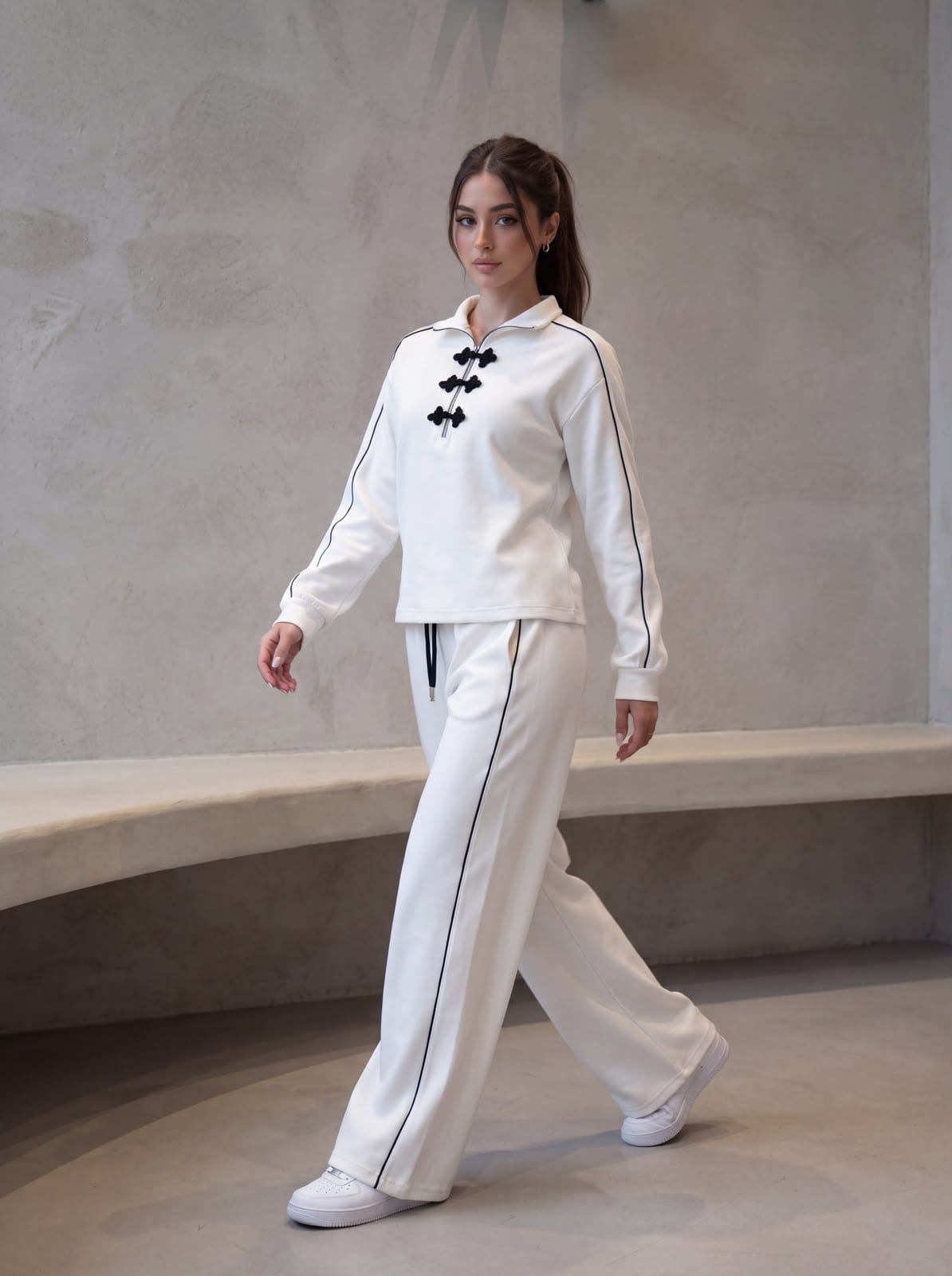 The same tracksuit in white.