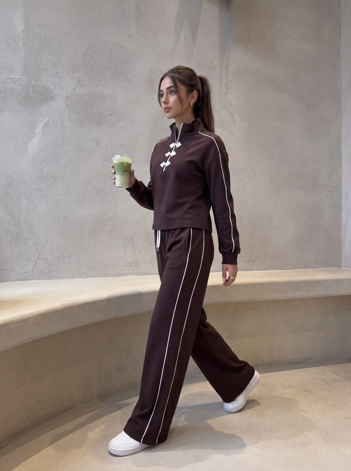 The same tracksuit in brown.