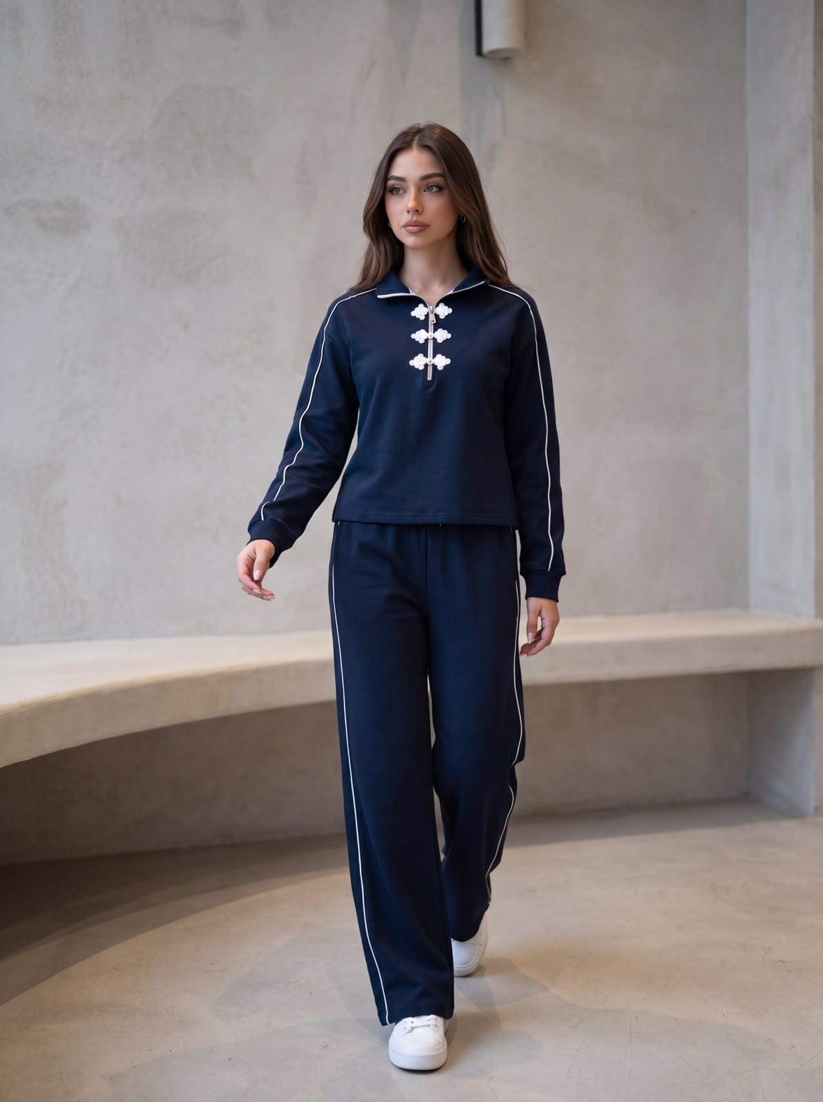 The same tracksuit in navy.